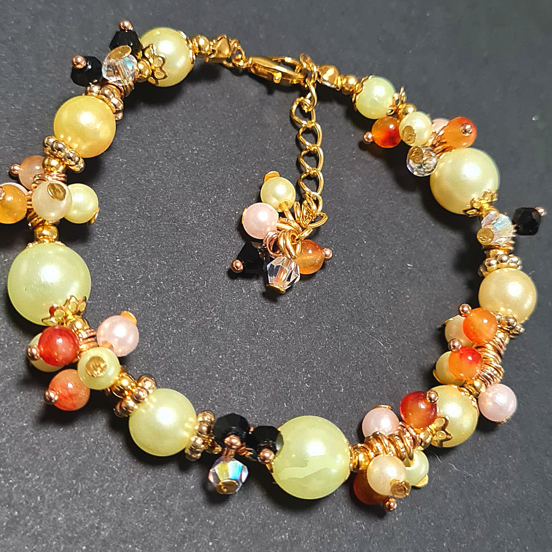 Bracciale a grappolo Perle tonalità Verde e ambra