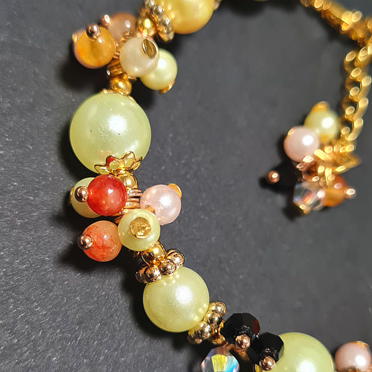 Bracciale a grappolo Perle tonalità Verde e ambra