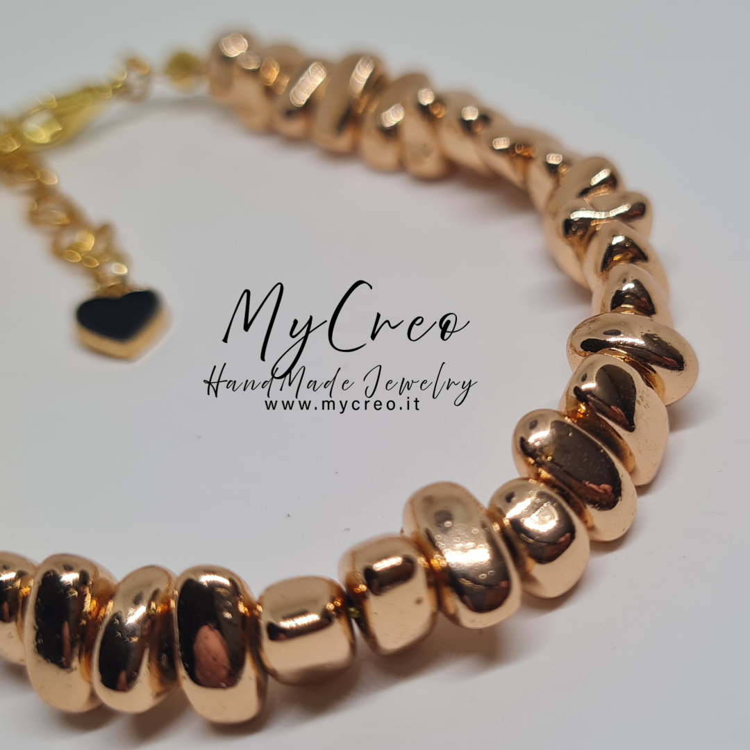 Bracciale Semirigido con Perle di Ematite Dorata Asimmetrica