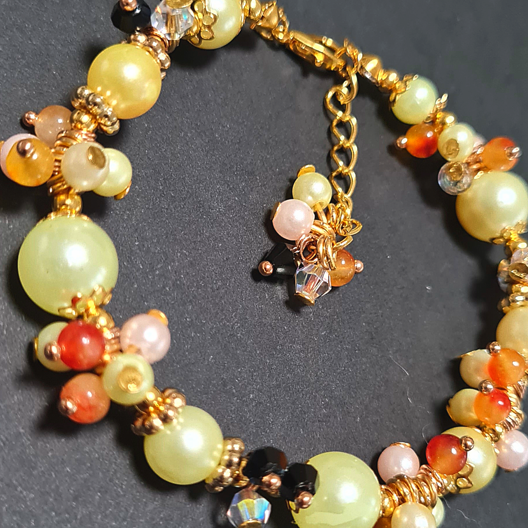 Bracciale a grappolo Perle tonalità Verde e ambra